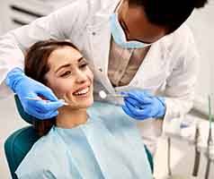 Woman smiling during dental checkup